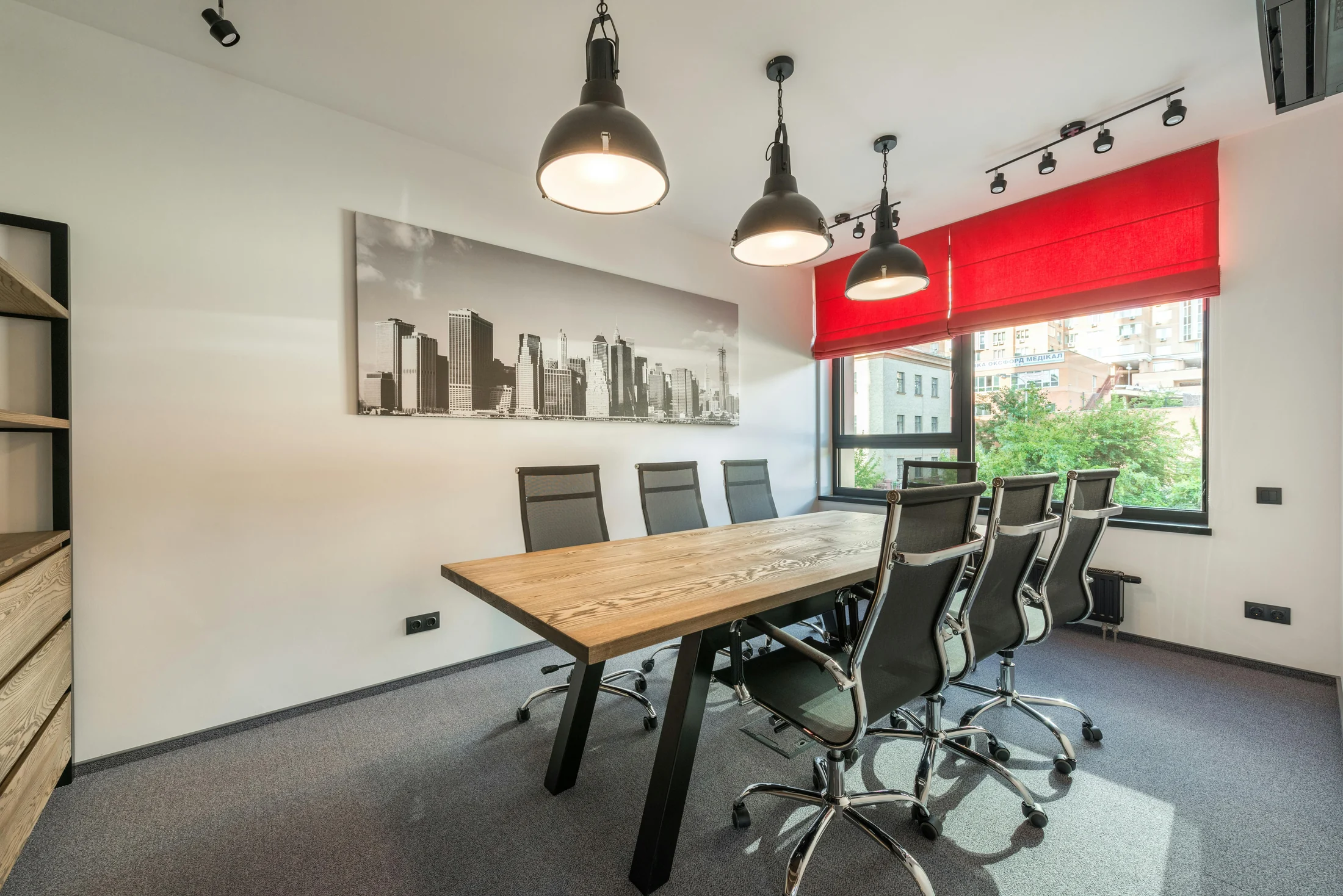 Bright commercial meeting space with carefully finished walls