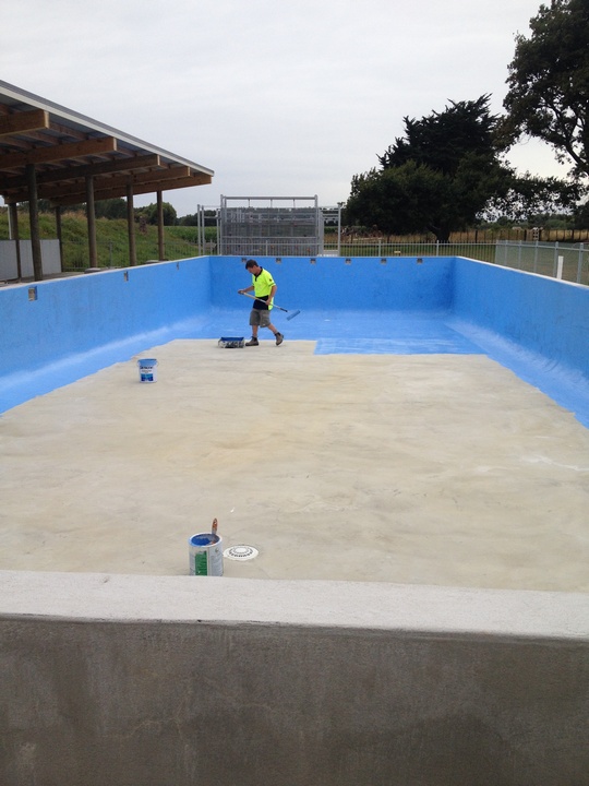 landscape exterior of a two-story home with a balcony