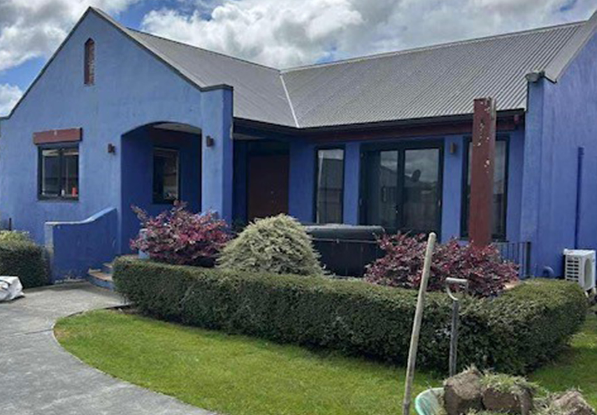 House front before painting - blue